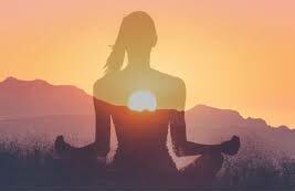 a person meditating and healing